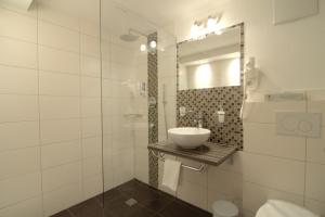 Ett badrum på Hotel Traube - Stelvio