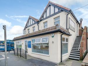 a building with a bus parked in front of it at Kays in Cleveleys