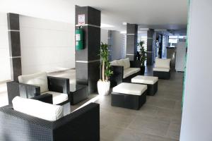 Uma área de estar em Hotel Onix T