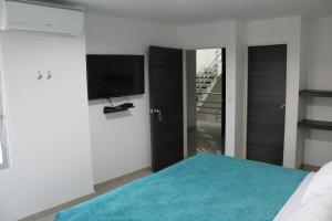 Uma cama ou camas num quarto em Hotel Onix T