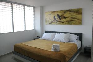 Uma cama ou camas num quarto em Hotel Onix T