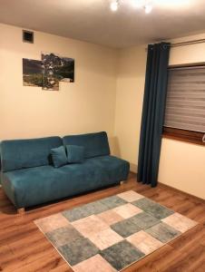 Część wypoczynkowa w obiekcie Dębowy Apartamenty/Pokoje