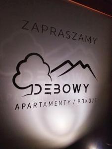 Certyfikat, podpis lub inny dokument wystawiony w obiekcie Dębowy Apartamenty/Pokoje