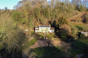 an aerial view of a house on a hill at The Snicket - Traditional Cotswold Home in Cheltenham