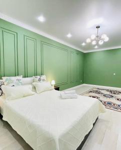 Postel nebo postele na pokoji v ubytování # 31 Элегантная и просторная квартира