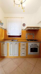 A kitchen or kitchenette at Villa Marea
