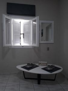 TV a/nebo společenská místnost v ubytování Margarita Santorini 1