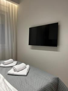 Postel nebo postele na pokoji v ubytování Real Apartment Banovci