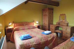 Katil atau katil-katil dalam bilik di Barnwell Farm Cottages Corn cottage
