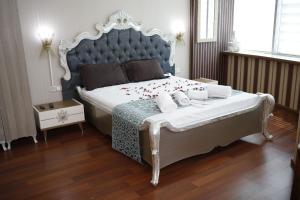 Un ou plusieurs lits dans un hébergement de l'établissement Safir Hotels Silivri