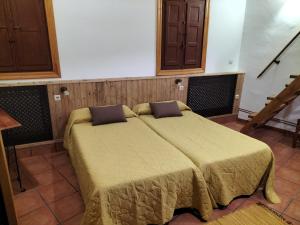 Postel nebo postele na pokoji v ubytování Don Camino