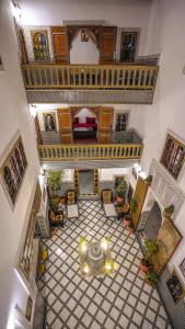 an overhead view of a room with a tiled floor at Riad Green House in Fez