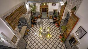 an overhead view of a tile floor in a house at Riad Green House in Fès
