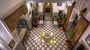 an overhead view of a tile floor in a building at Riad Green House in Fès