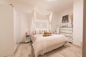 A bed or beds in a room at IL NIDO DEL FASO