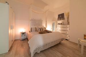 A bed or beds in a room at IL NIDO DEL FASO