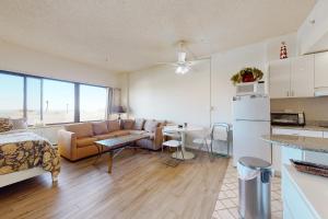 a kitchen and living room with a couch and a table at Highpoint North M1 in Ocean City