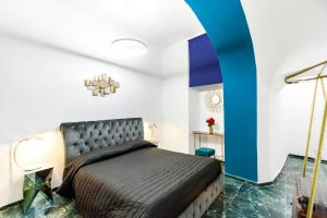 A bed or beds in a room at Navona Artist 10 APT