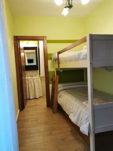 Postel nebo postele na pokoji v ubytování La Cerca