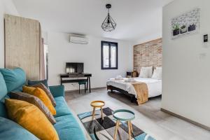 En eller flere senge i et værelse på Espaces 55, Maison de ville au centre de Lavaur