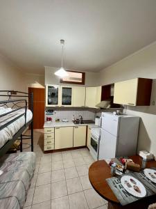 Kuchyň nebo kuchyňský kout v ubytování Pinpoint Rooms