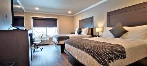 The Elet Hotel客房内的一张或多张床位