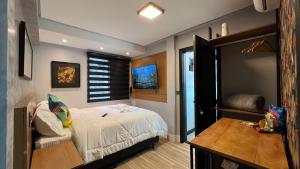Cama ou camas em um quarto em Hotel La Serena