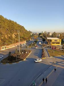 an aerial view of a street with cars on the road at ManavgatApartment in Manavgat