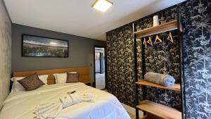 Cama ou camas em um quarto em Hotel La Serena