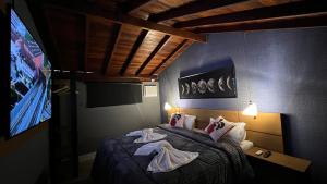 Cama ou camas em um quarto em Hotel La Serena