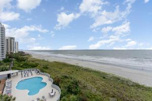 a view of the beach from the balcony of a condo at Gorgeously remodeled 2 bedroom ocean front unit - 509 South Hampton condo in Myrtle Beach