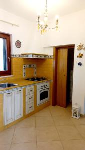 A kitchen or kitchenette at Villa Marea