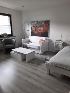Ένα ή περισσότερα κρεβάτια σε δωμάτιο στο Happy Living
