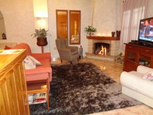 TV a/nebo společenská místnost v ubytování Hostal El Retiro