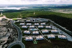 an aerial view of a resort complex with a road at Royal Obidos Spa & Golf Resort in Casal da Lagoa Seca