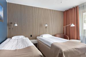 Voodi või voodid majutusasutuse Best Western Centralhotellet toas