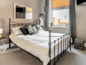 Кровать или кровати в номере Tapestry House