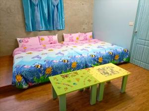 Voodi või voodid majutusasutuse Time Travelodge Homestay toas