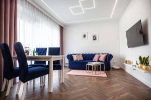 TV a/nebo společenská místnost v ubytování Apartament Leśny Taras z KLIMATYZACJĄ & Garaż podziemny w cenie-728-828-835- Targi Kielce