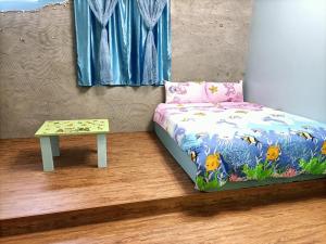 Voodi või voodid majutusasutuse Time Travelodge Homestay toas