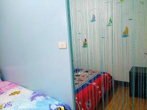 Voodi või voodid majutusasutuse Time Travelodge Homestay toas