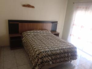 Una cama o camas en una habitación de Alojaserve