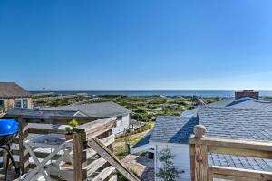 a view of the ocean from the balcony of a house at Fernandina Cottage Deck, Direct Beach Access in Fernandina Beach