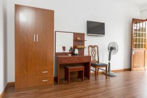 TV a/nebo společenská místnost v ubytování Caroline Resort