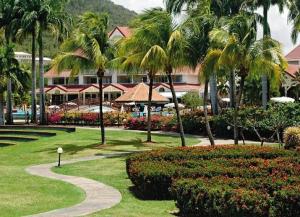 Giardino di Studio Tropical avec vue mer dans une résidence hôtelière