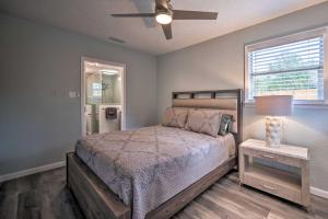 a bedroom with a bed and a ceiling fan at Apopka Getaway with Yard and Covered Patio in Apopka