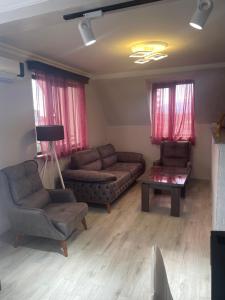 Χώρος καθιστικού στο Hotel Chaika