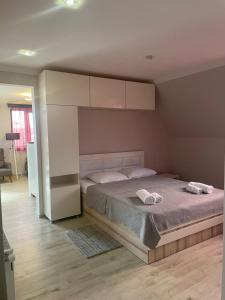 Ένα ή περισσότερα κρεβάτια σε δωμάτιο στο Hotel Chaika
