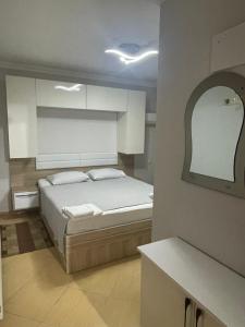 Ένα ή περισσότερα κρεβάτια σε δωμάτιο στο Hotel Chaika