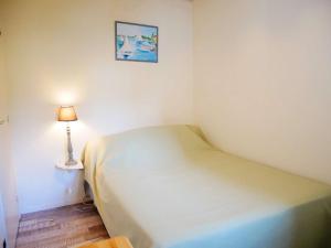 En eller flere senge i et værelse på Appartement Carnac, 2 pièces, 4 personnes - FR-1-477-143